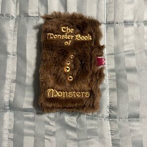 Monster Book of Monsters iPhone Wallet Case The Wizarding World of Harry Potter